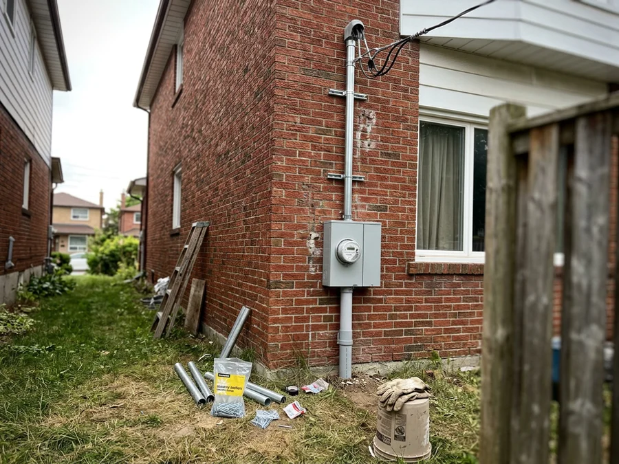 Completed 200A service with new mast, weatherhead, and meter base