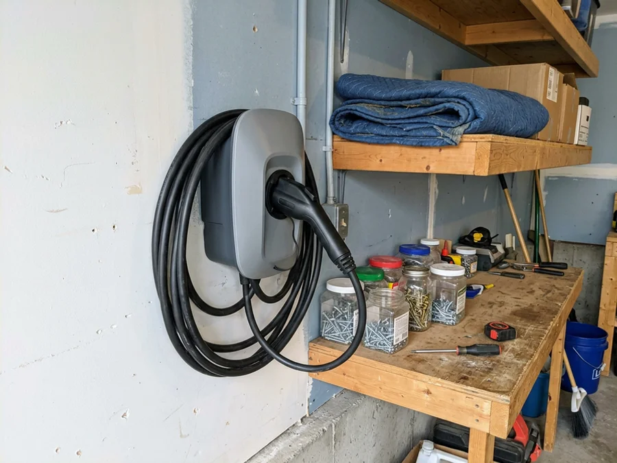 Finished Tesla Wall Connector mounted on a Toronto garage wall