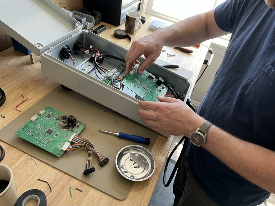 Replacement circuit board fitted into a Level 2 charger enclosure